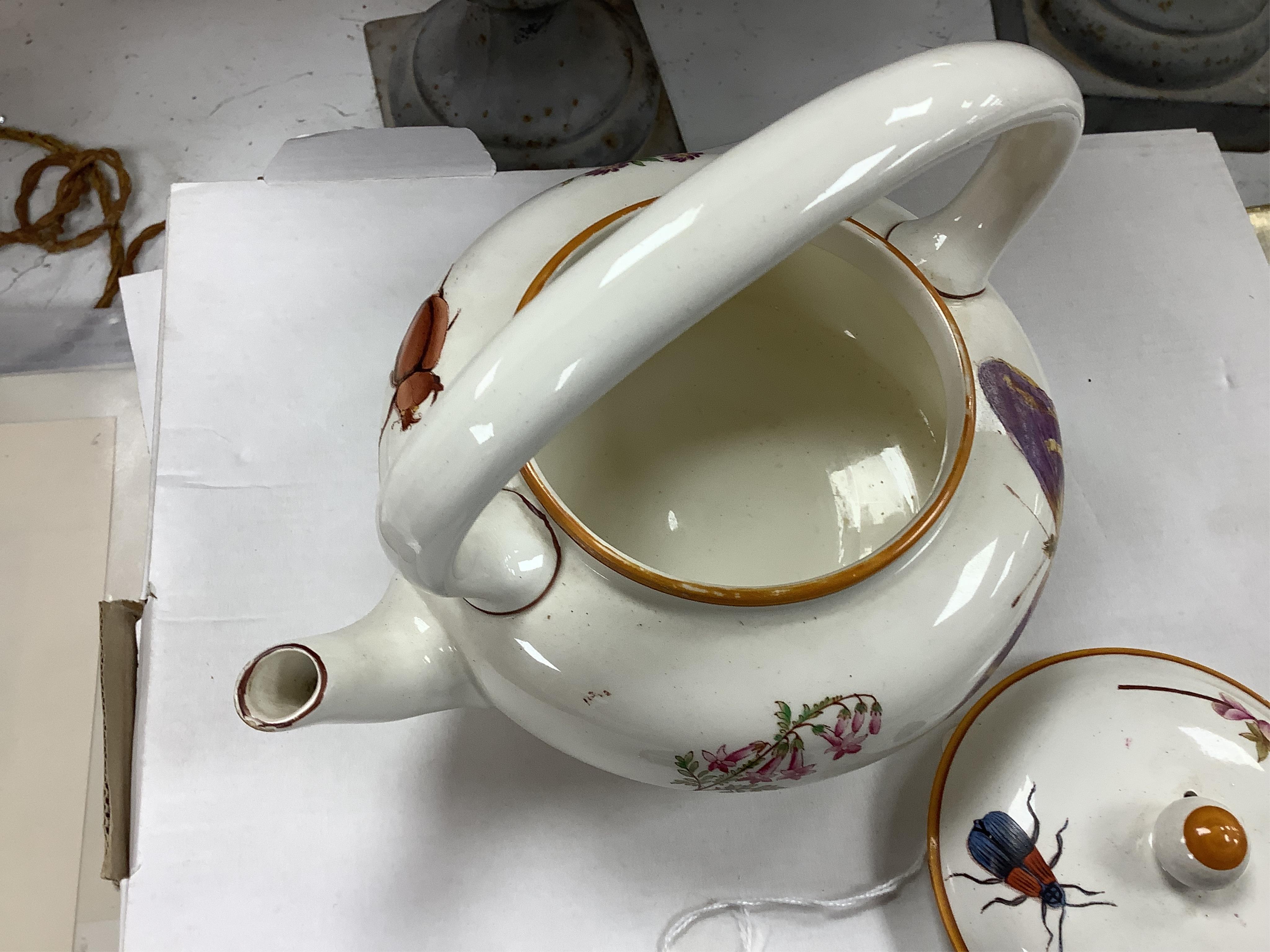 An early 19th century Derby three piece tea service, A pair of Staffordshire cow groups, Wedgwood etc